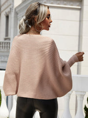 Rose boat neck ribbed dolman knit sweater with wide sleeves.
