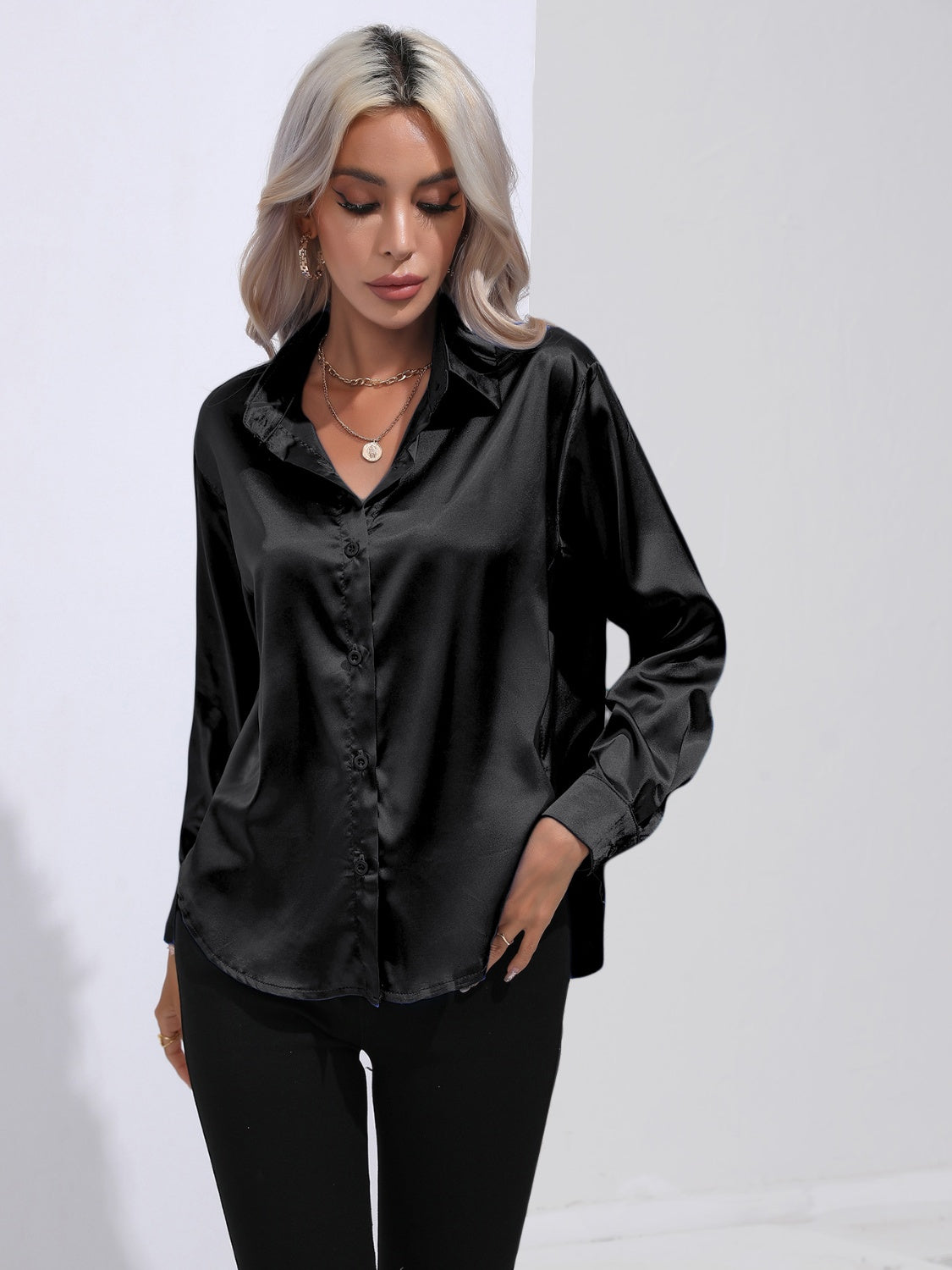 Black satin tie-front blouse with buttoned front and collared neckline