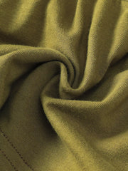 Olive green baby top fabric detail with visible stitching.