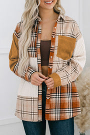 Patchwork plaid knit shacket in sherbet with button front and chest pocket.