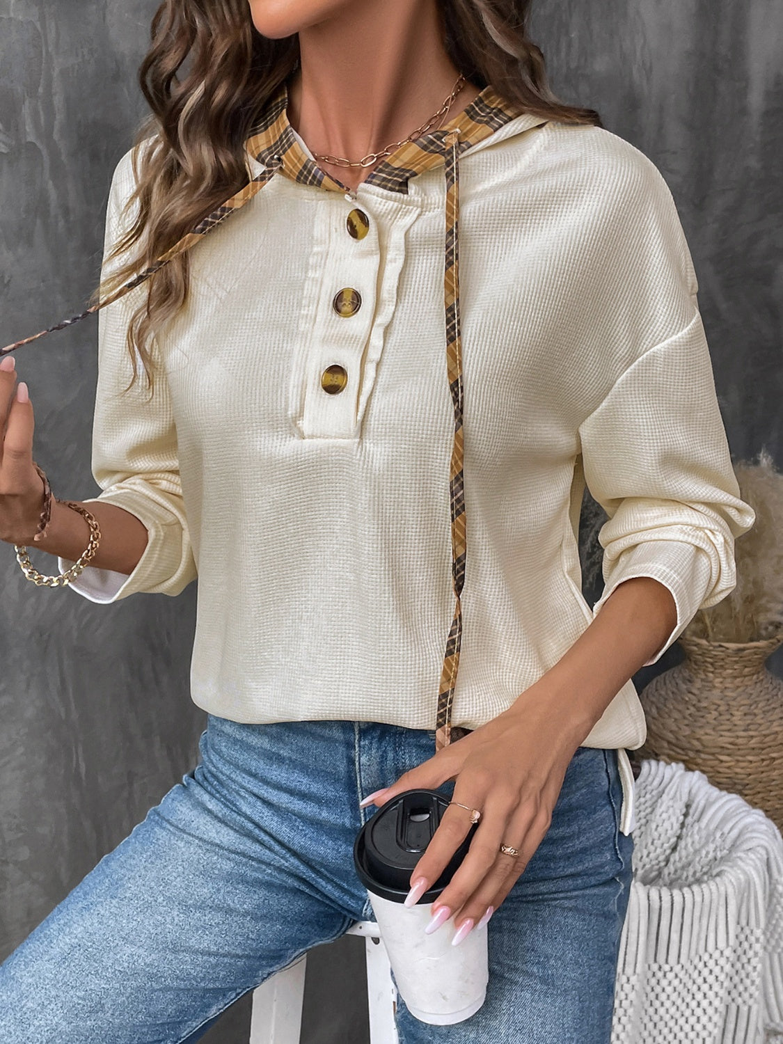 Cream waffle knit henley hooded top with plaid drawstring and button detail