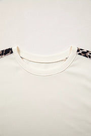 Leopard Patchwork Uneven Hem Short Sleeve Top, model styling view