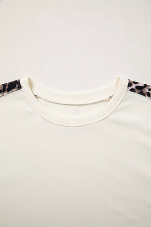 Leopard Patchwork Uneven Hem Short Sleeve Top, model styling view