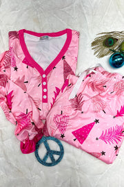 Pink festive print henley pajama set with button front and drawstring pants.