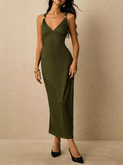 Olive ribbed midi dress with V-neck and gold-detail straps.