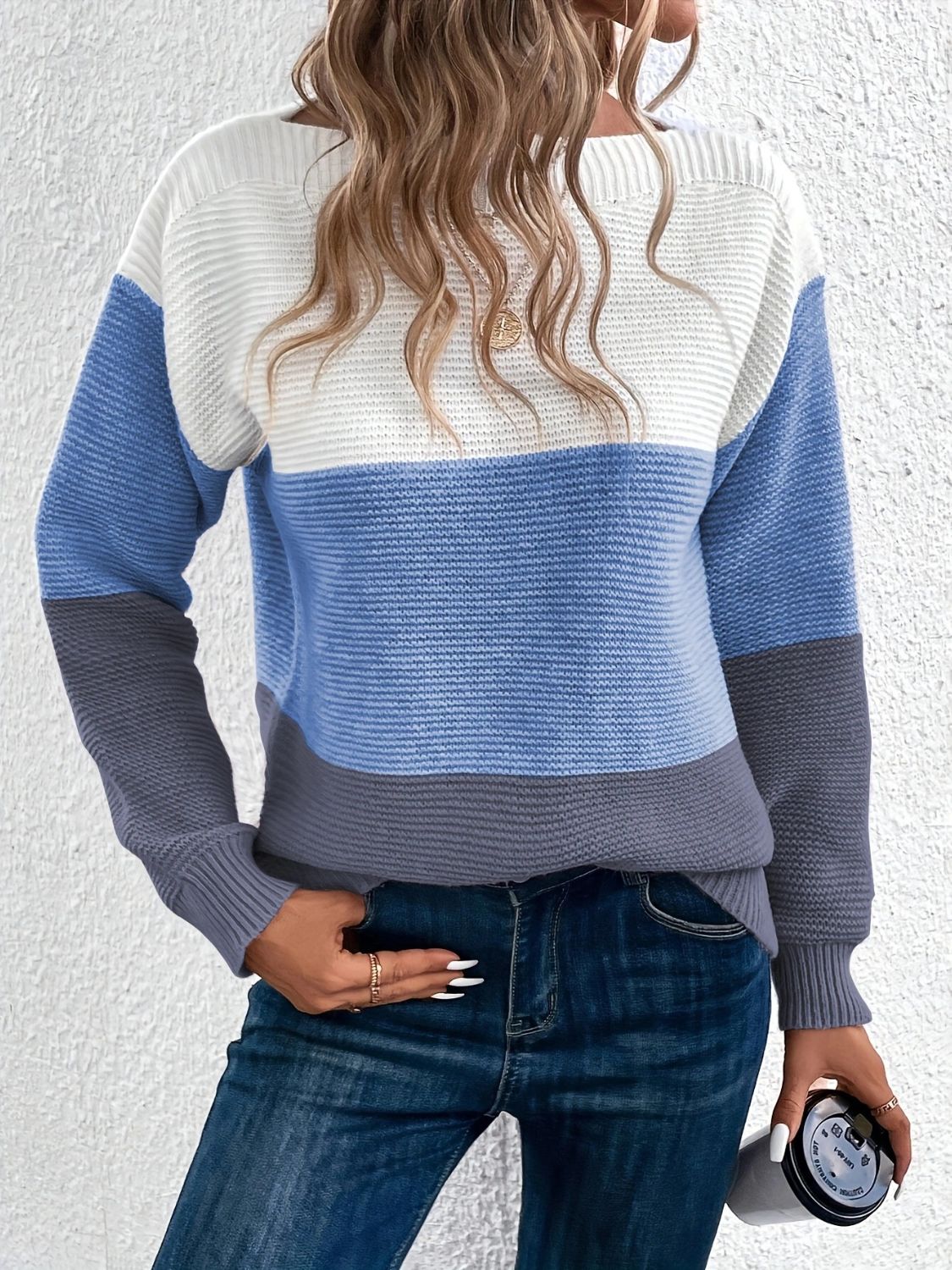 Colorblock boatneck ribbed knit sweater in white, light blue, and dark gray.