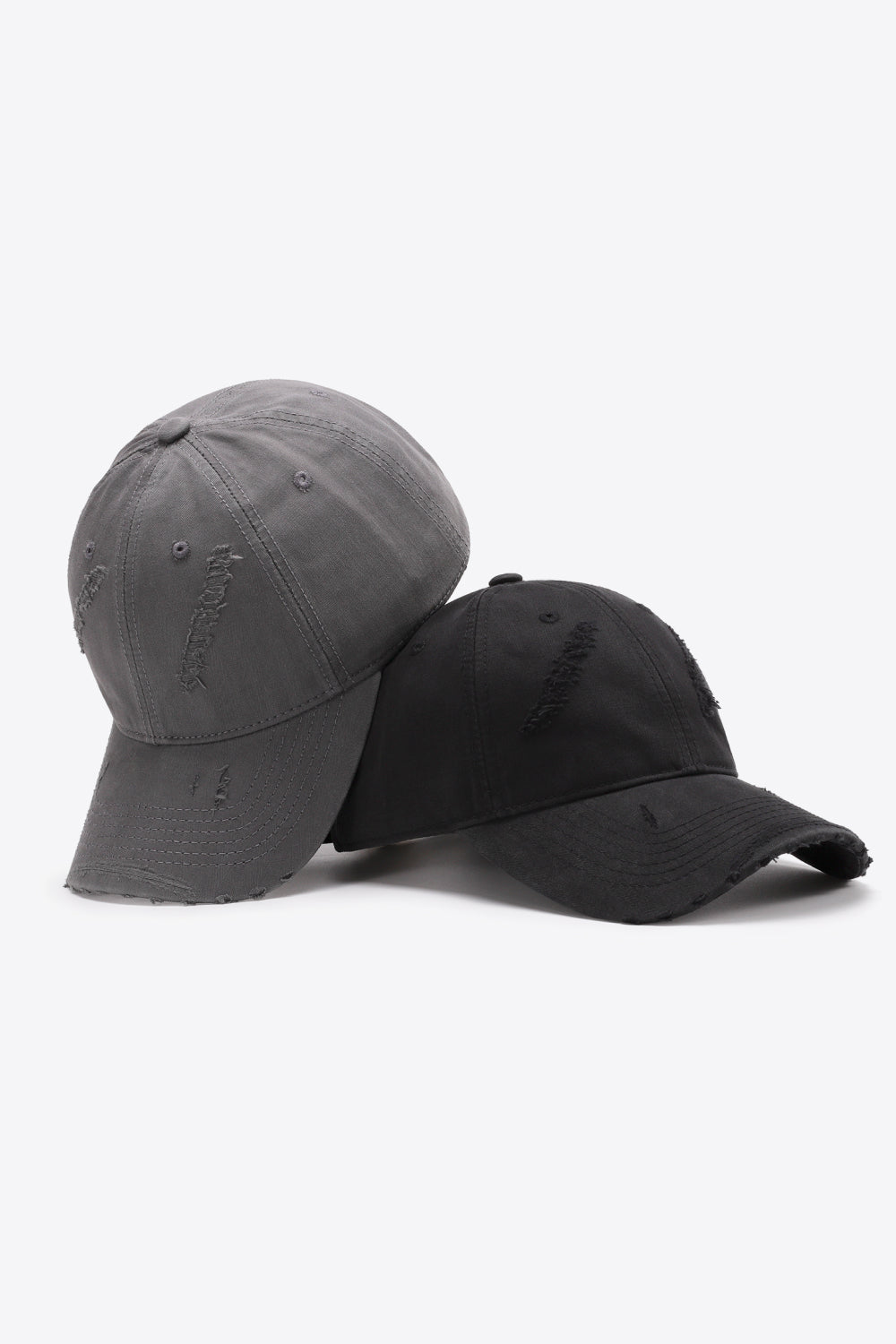 Mid gray and black distressed baseball caps with adjustable fit
