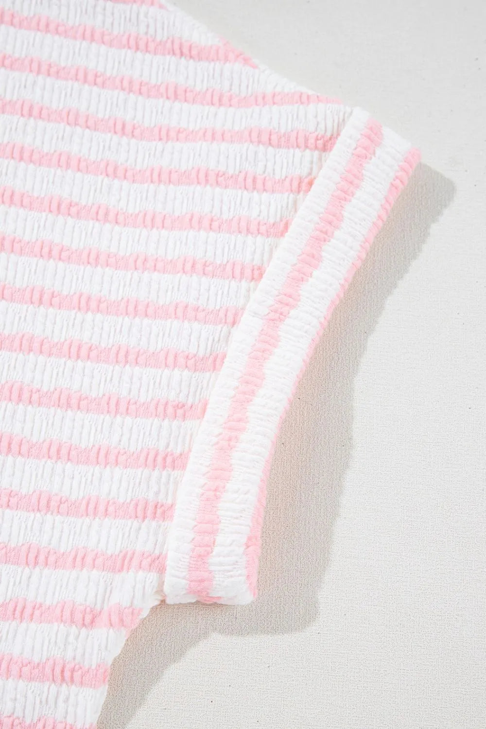 Blush pink and white striped textured loungewear set, short sleeve top detail.