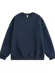 Navy blue oversized crew-neck sweatshirt with ribbed cuffs and hem.