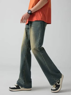 Men's wide-leg jeans in a distressed dark blue wash with a relaxed fit.