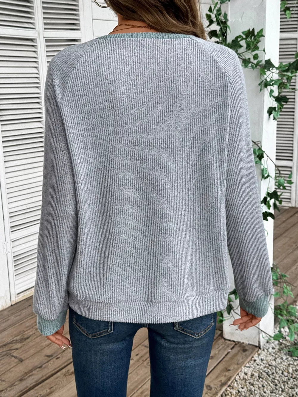 Gray ribbed maternity shirt with contrast trim, acrylic blend.