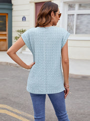 Light blue textured cap-sleeve tee with subtle knit, casual style