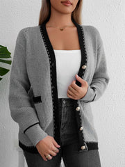 Gray knit cardigan with black contrast trim and gold buttons