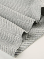 Gray ribbed long sleeve buttoned romper detail