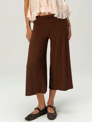 Brown relaxed wide leg capris with a comfortable fit and a cinched waist.