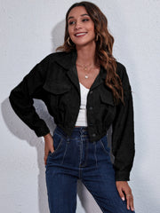 Black corduroy cropped utility jacket with buttoned chest pockets and elastic hem