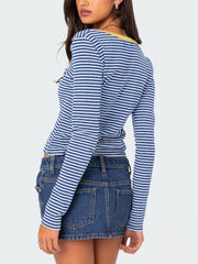 Blue and white striped long sleeve henley shirt with a contrast yellow collar.