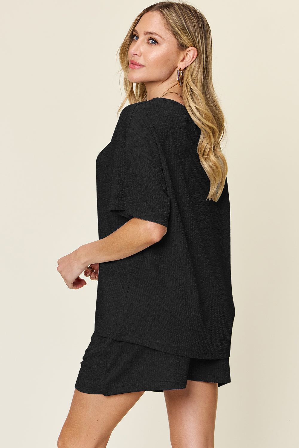 Black waffle knit boxy tee and shorts set with short sleeves and a relaxed fit.