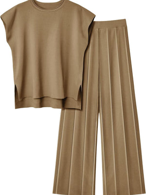 Camel knit co-ord with seamed wide-leg pants and a short-sleeve top with side slits.