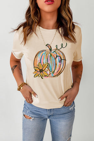Sand t-shirt with colorful painted pumpkin graphic and flower detail.
