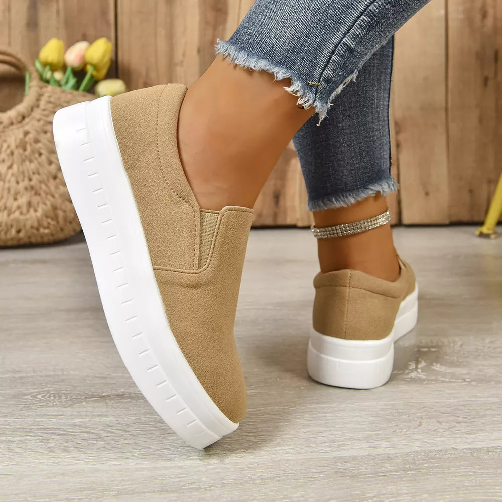 Round Toe Platform Slip-ons in Black, close-up detail