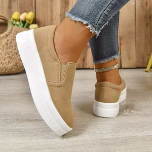 Round Toe Platform Slip-ons in Black, close-up detail