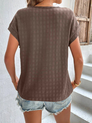Woven texture cap-sleeve top in tan with a relaxed fit.
