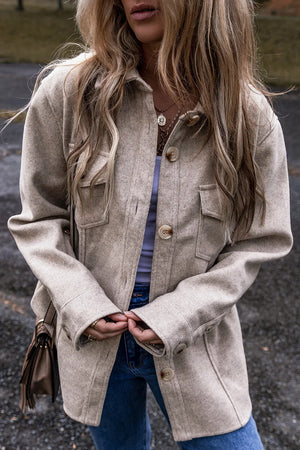 Fleece utility shirt jacket in Dust Storm with buttoned pockets and cuffs.