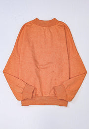 Acid wash mock neck sweatshirt in Sherbet with ribbed cuffs and hem.