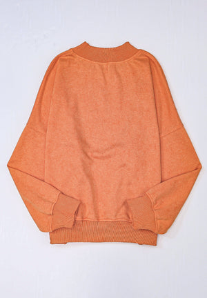 Acid wash mock neck sweatshirt in Sherbet with ribbed cuffs and hem.