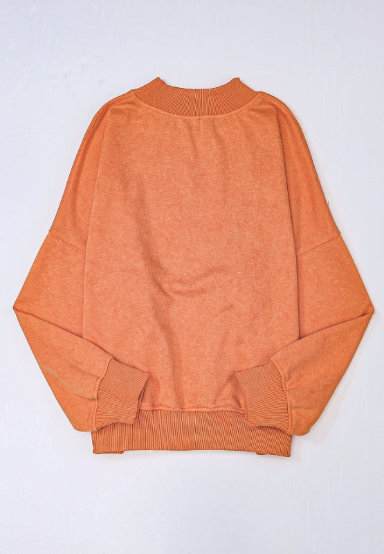 Acid wash mock neck sweatshirt in Sherbet with ribbed cuffs and hem.