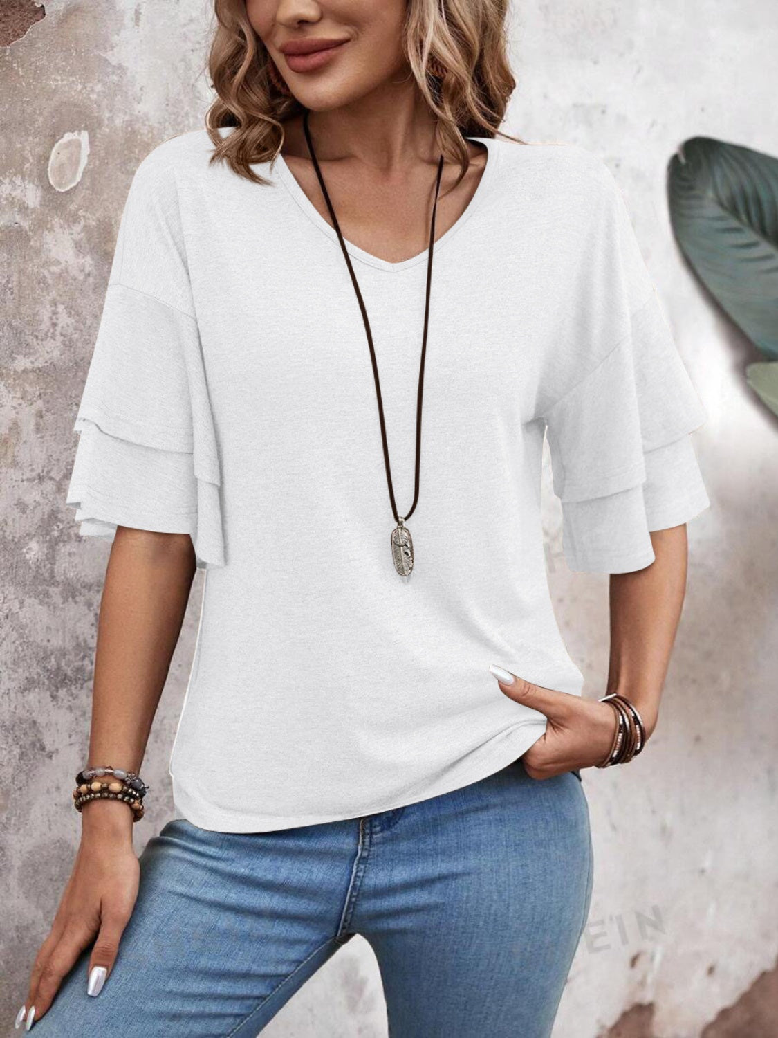 White jersey tee with v-neck and tiered short sleeves