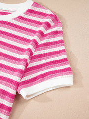Textured knit tee with pink and white stripes and crossed detail.
