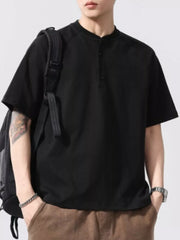 Black buttoned henley t-shirt for men with short sleeves and a band collar.