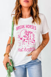 White graphic tee with "Break Horses not hearts" print, featuring a desert scene with a rider.