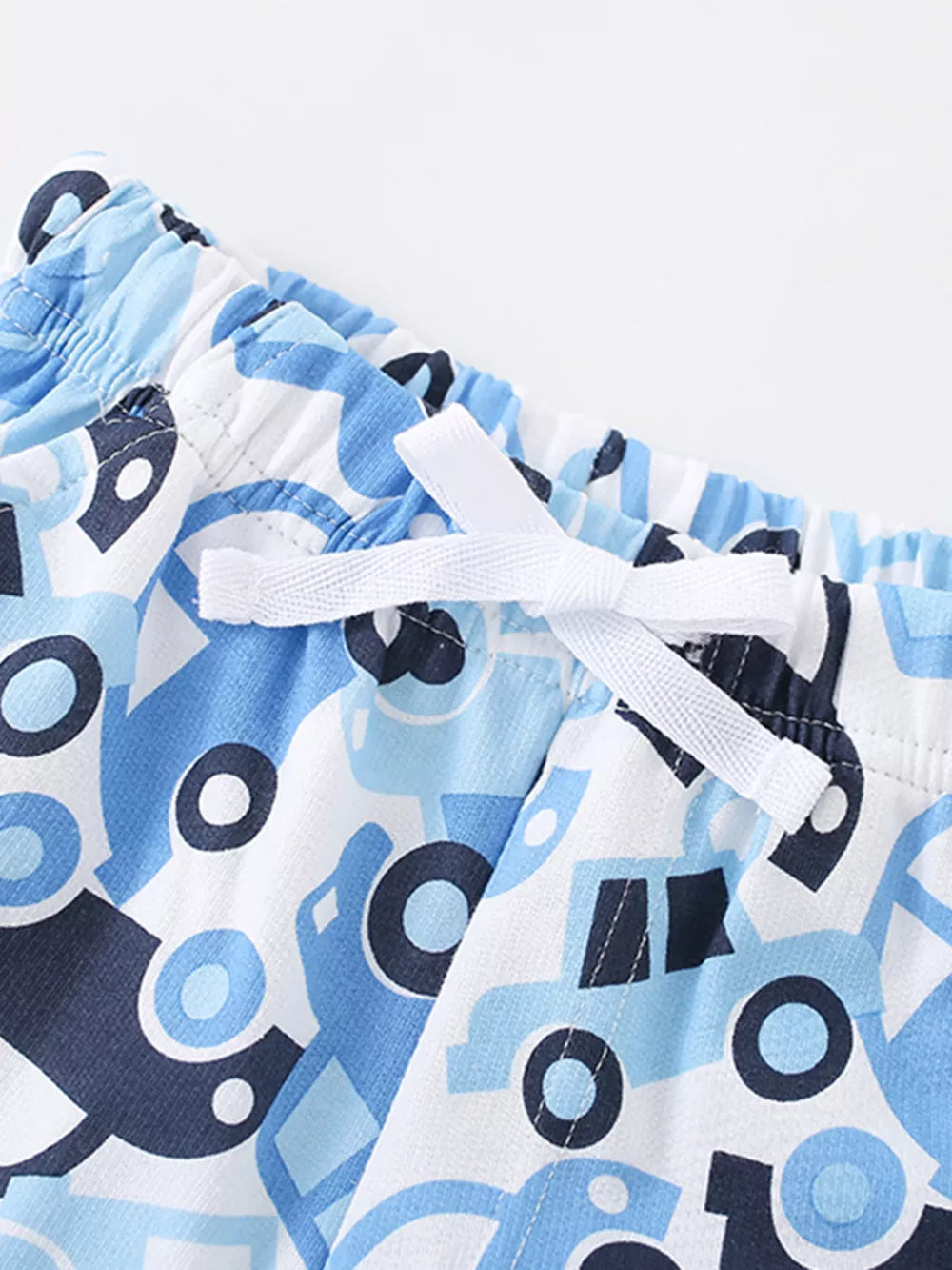 Toddler shorts with blue car print and white drawstring detail