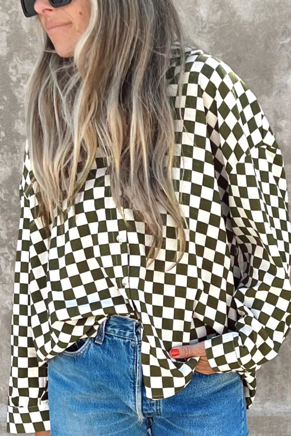 Olive checkered button-down shirt with a relaxed fit, styled with denim.