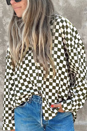 Olive checkered button-down shirt with a relaxed fit, styled with denim.