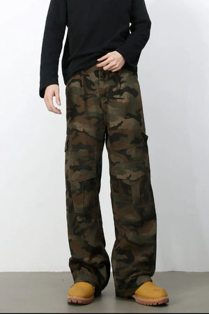 Cargo Camo Wide-Leg Utility Trousers in green camouflage with multiple pockets.