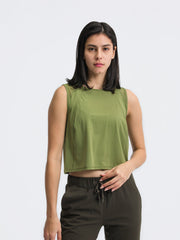 Moss green cropped active tank with mesh inset at the neckline and shoulders.