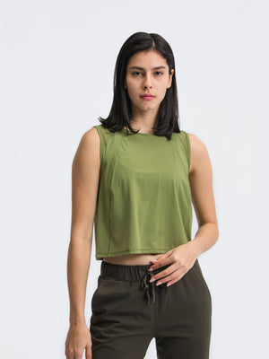 Moss green cropped active tank with mesh inset at the neckline and shoulders.