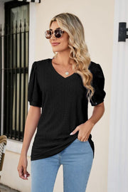 Black perforated puff sleeve V-neck blouse with eyelet detail