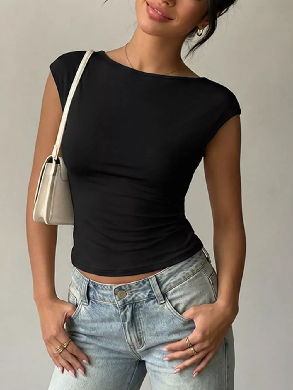 Black cap-sleeve maternity t-shirt with boatneck and lace trim detail