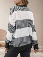Black and white striped knit crewneck sweater with a relaxed fit.