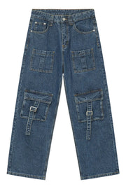 Medium wash denim cargo pants with buckle flap pockets and utility detailing.