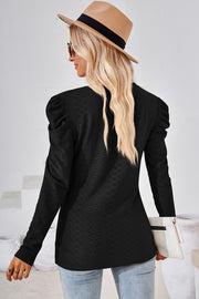 Black textured puff-sleeve crew neck top with a diamond pattern