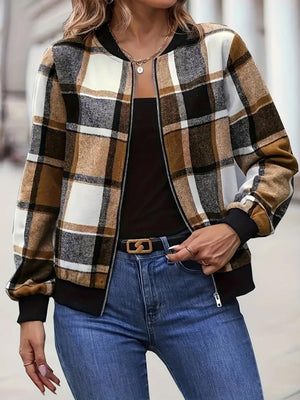 Plaid bomber jacket with ribbed cuffs in caramel, black, and white.