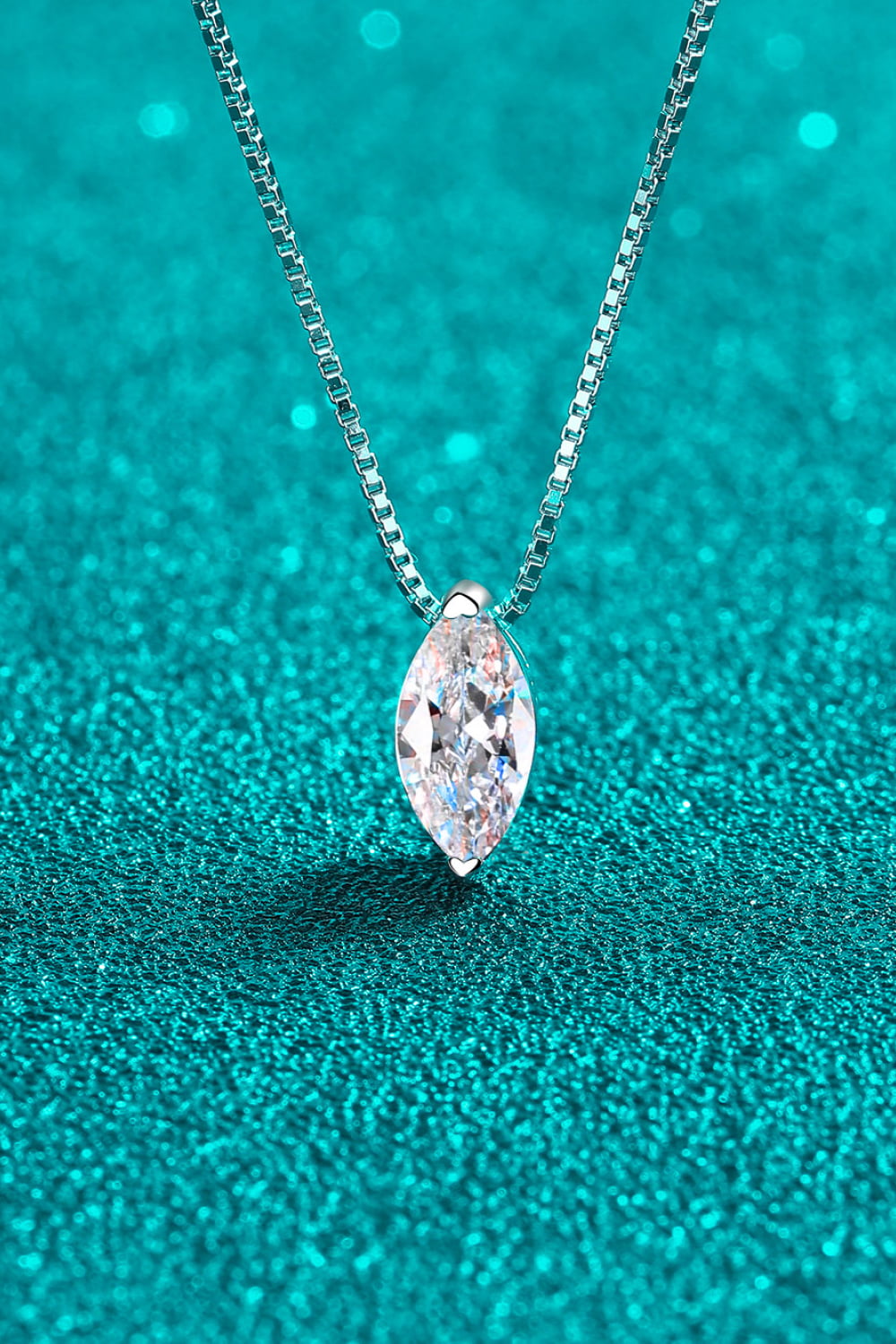 Silver marquise cut crystal pendant necklace with delicate chain.