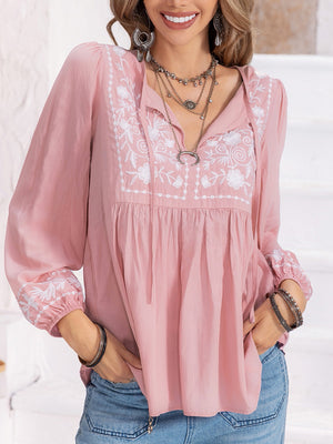 Blush pink embroidered yoke blouse with gathered bodice and tie neck