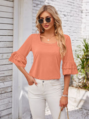 Peach ruffled sleeve square neck blouse with a casual fit.
